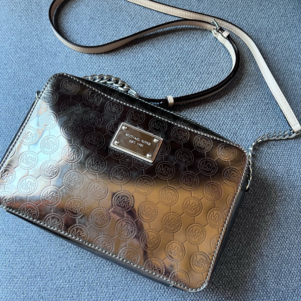 Michael Kors bronze metallic Crossbody with tan straps and interior.